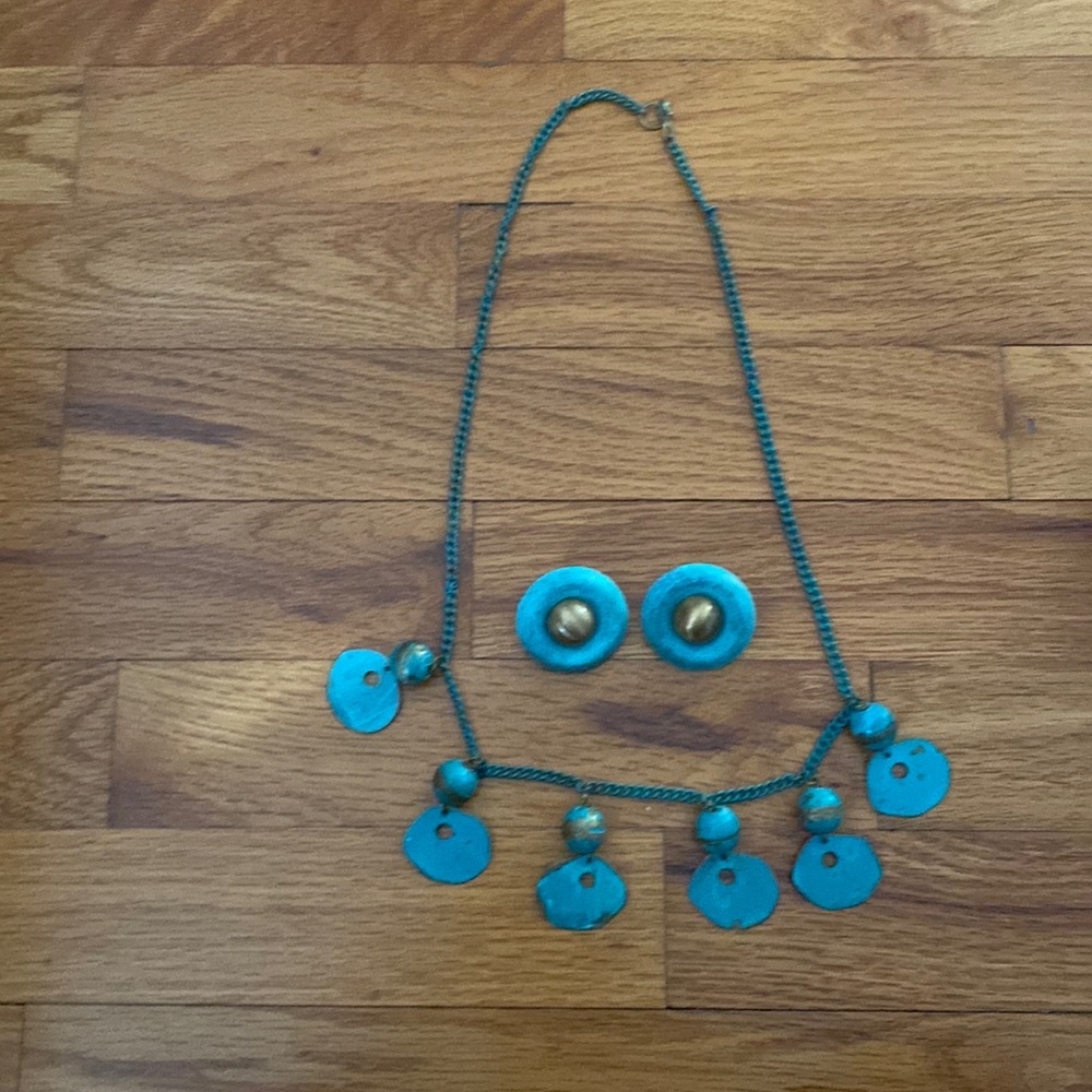 Fun brass 14.5 inches long Necklace with matching earrings with patent mark